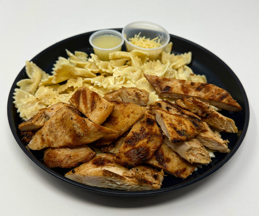 Grilled chicken breast mixed with bow tie pasta, mozzarella balls topped with our low fat Alfredo sauce - West Orange NJ Meal Preps