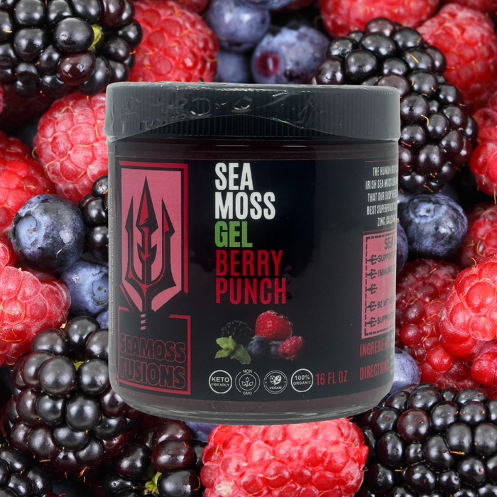 Sea moss gel container labeled 'Berry Punch' surrounded by berries