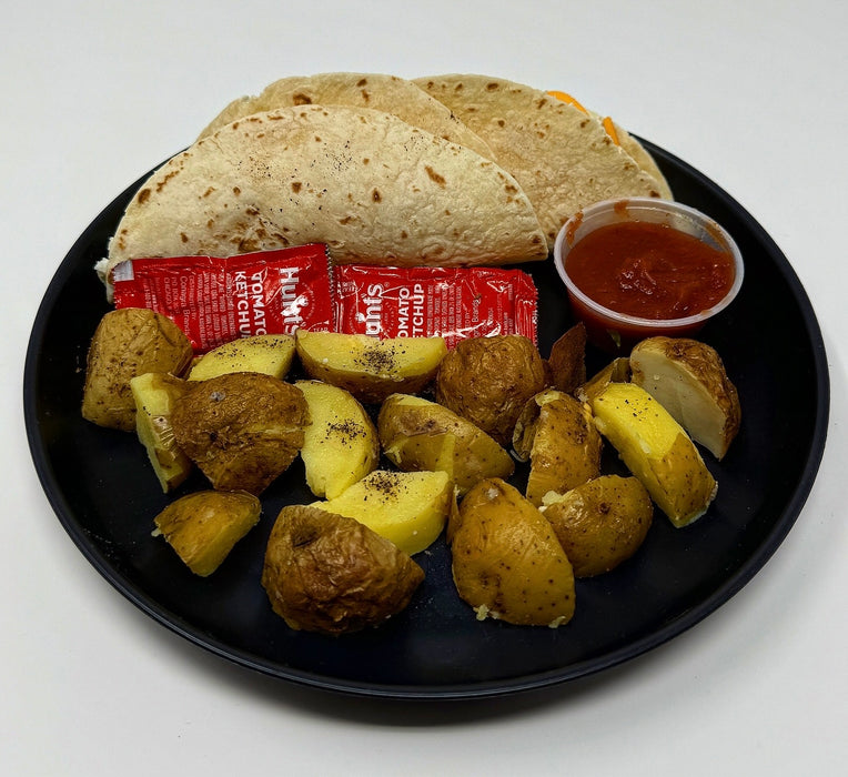 2 flour tortillas stuffed with egg whites, low-fat cheese, turkey bacon bites, seasoned potato cubes with a side of house salsa - Franklin Lakes NJ Meal Preps.