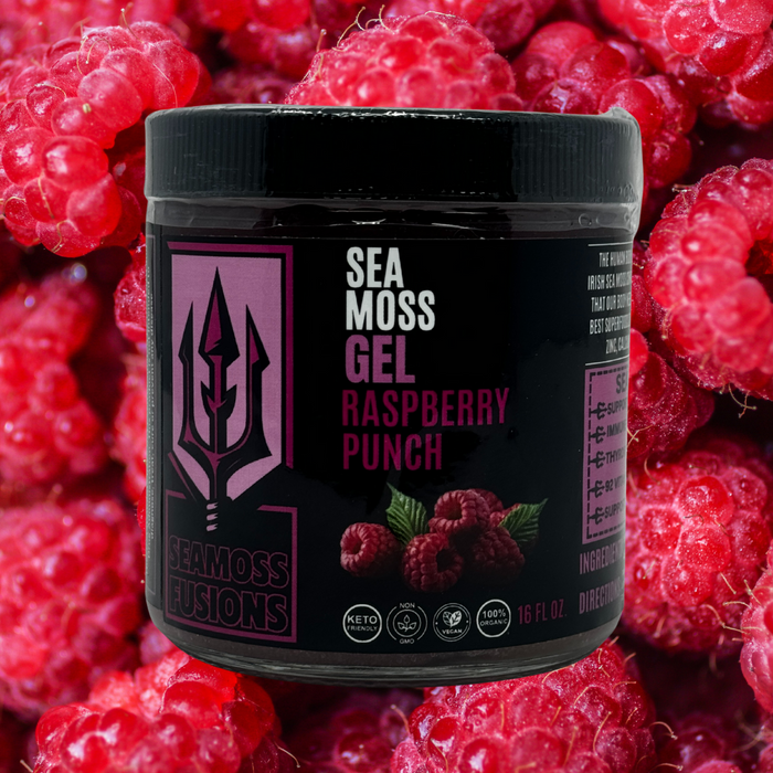Sea moss gel container with raspberry punch flavor surrounded by raspberries
