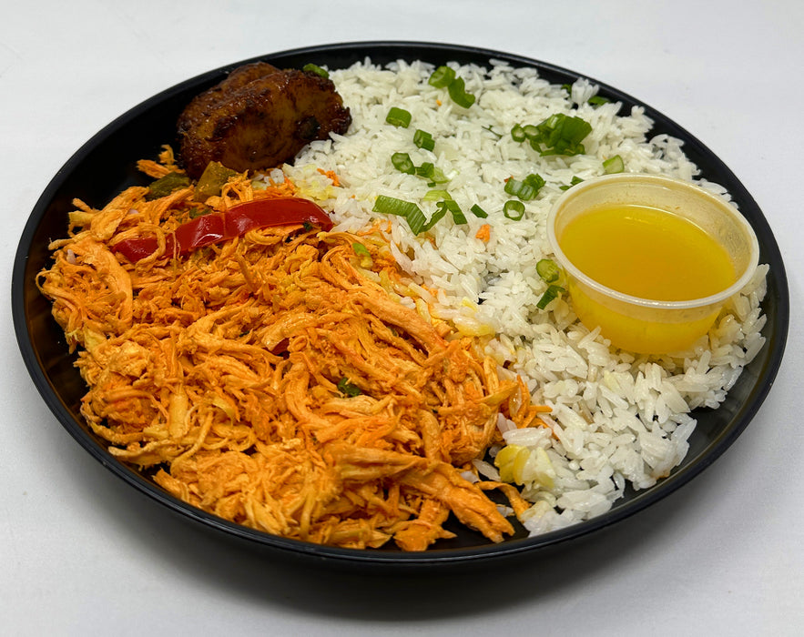 shreddedchicken-spartanmealpreps-fortleenjmealprepdeliveryservice - shredded chicken paired with jasmine rice sweet plantains and a house sauce served on a black plate.