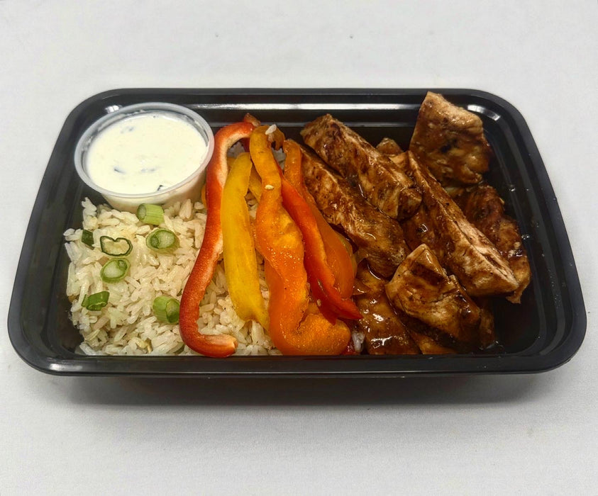Grilled chicken paired with jasmine rice mixed with corn and paired with peppers and house tzatziki sauce - Carlstadt NJ Meal Prep