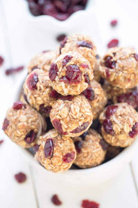 Small oat infused protein balls with cranberries coconut and chocolate - nj meal prep