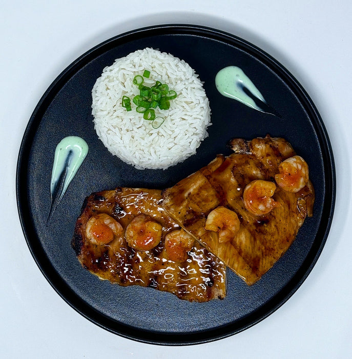 Grilled chicken breast paired with lemon pepper shrimp, rice, green beans and side cup of pineapples and house sauce - Fort Lee NJ Meal Preps.