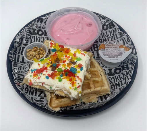 Delicious protein infused fruity pebbles waffle paired with strawberry yogurt parfait. - Ridgefield NJ Meal Preps