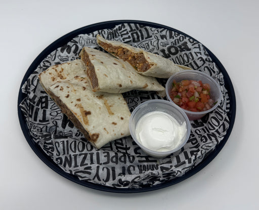 Seasoned flank steaked tossed in our low-fat cheese salsa stuffed inside a flour tortilla paired with our house-made salsa and sour cream - Passaic NJ Meal preps
