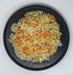 Pasta with shrimp on a black plate