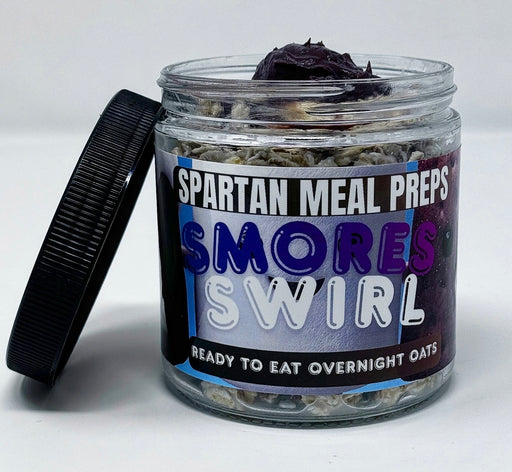 Overnight oats inside a glass jar with black lid.  a meal prep made by spartan meal preps nj.