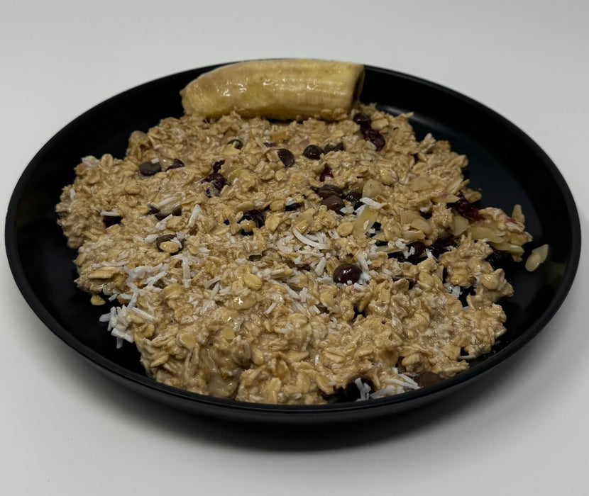 Rolled oats mixed with chocolate chips paired with bananas, almond slivers, dried cranberries, granola &amp; coconut shreds - Paramus NJ Meal Preps