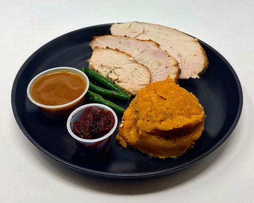 Herb Crusted Turkey breast paired with sweet potato mash, green beans, cranberry sauce with a side cup of low-fat gravy. Spartan Meal Preps New Jersey Meal Prep Company Selling Healthy food in new jersey.