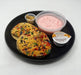 Spartan meal preps nj - birthday cake protein pancakes paired with strawberry yogurt, granolla and a sugar free syrup cup on a black plate