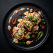 Plated dish of pasta with chicken and vegetables on a black background