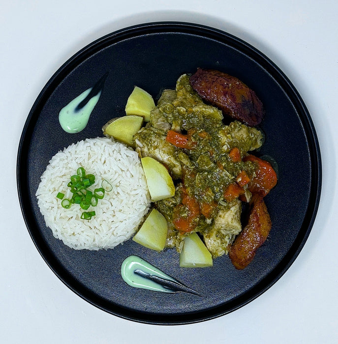 Delicious chicken cubes tossed in house green sauce paired with jasmine rice, carrots, and sweet plantains. This is a must-try meal! - Spartan Meal Preps Franklin Lakes New Jersey Meal Prep Company
