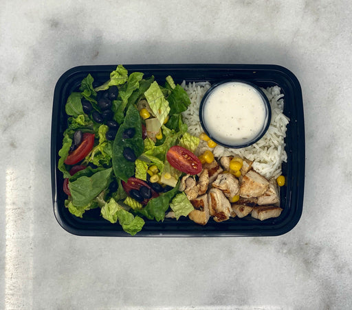 Seasoned grilled chicken paired with brown rice, buttered corn, black beans, shredded lettuce, diced grape tomatoes and house sauce - spartan meal preps