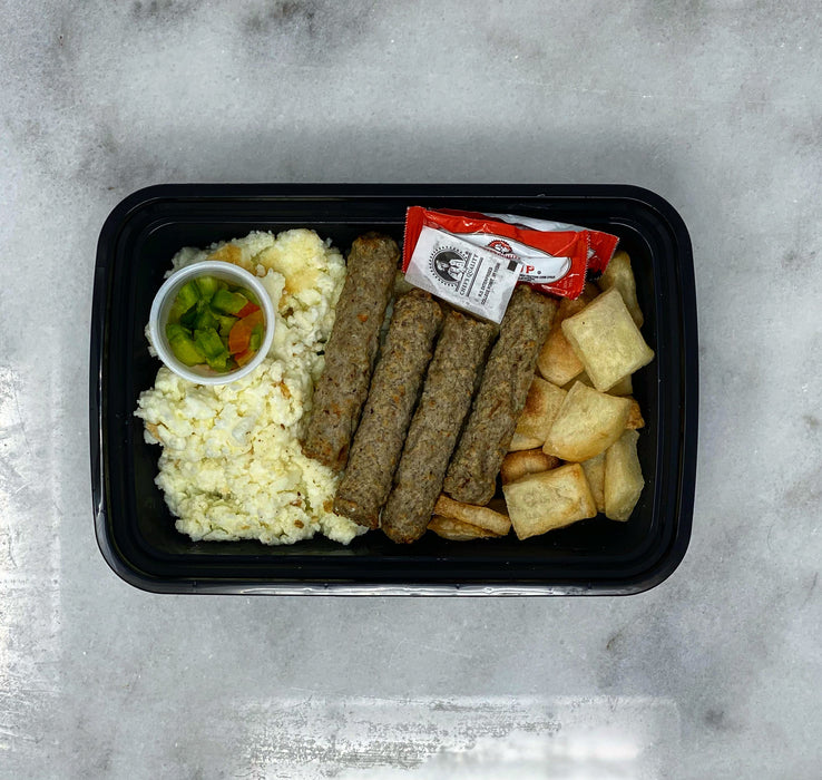 4 Turkey sausage links mixed with egg whites, potato cubes , house pepper cup, 2 ketchup packets and 1 black pepper packet. - spartan meal preps meal prep delivery service