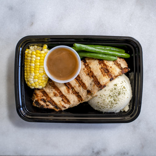Grilled chicken paired with mash potatoes corn green beans and house gravy cup - fresh meal delivery service